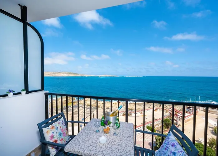 Islet Promenade Seafront 1 Bedroom Apartment With Sea View Balcony By Getawaysmalta